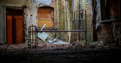 Inside abandoned WWI tuberculosis hospital where kids' dolls still hang from windows