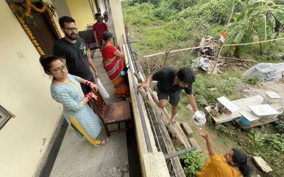 Migrant workers suffer as water enters tents, sheds