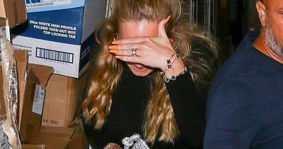 Adele spotted with mysterious never-before-seen bird tattoo on back