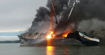 Shocking moment fishing boat erupted into fiery blaze as Navy step in to rescue crew