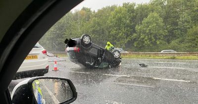 Car heading on M62 towards Manchester flips over and lands on roof on OTHER side of carriageway