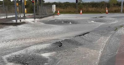 Heavy rain causes road to 'crumble' as Met Office predicts more severe weather to come