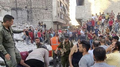 Syria: 10 killed in Aleppo building crash