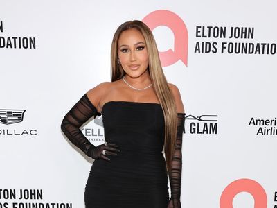 Adrienne Bailon describes how she helped her surrogate deliver son Ever in home birth