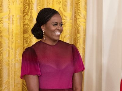 Michelle Obama praised for wearing ‘iconic’ braids to her White House portrait unveiling