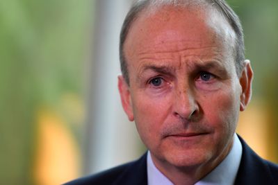Britain's Queen helped normalise relations with Ireland, PM Martin says
