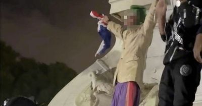 Some revellers blasted for climbing on Victoria memorial outside Buckingham Palace