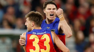 Brisbane Lions beat reigning AFL premiers Melbourne in thrilling semi-final at the MCG
