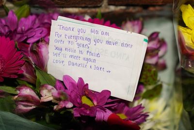 Floral tributes pile up at Sandringham as mourners hail ‘devoted’ Queen