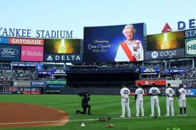 Queen dies aged 96: Landmarks lit up and flags at half mast as world mourns loss of monarch