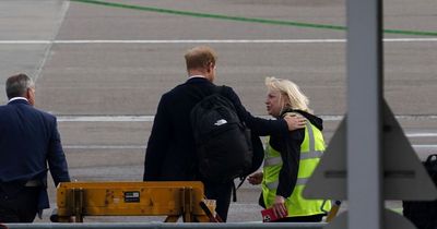 Prince Harry captured in touching moment with airport ground staff as he returns to London