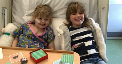 Little girls form special bond after suffering from same heart complications