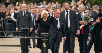 King Charles cheered by thousands as he arrives at Buckingham Palace after Queen's death