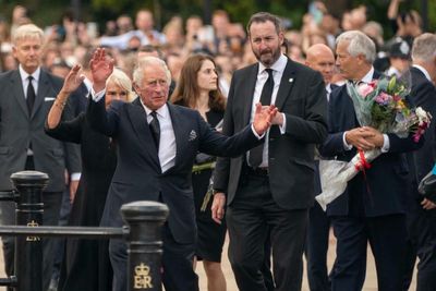 King Charles III arrives at Buckingham Palace to crowds of well-wishers