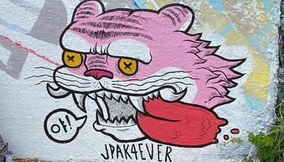 Jeff Pak’s mural of a pink tiger in Andersonville speaks to his Korean heritage (and creating cool art)