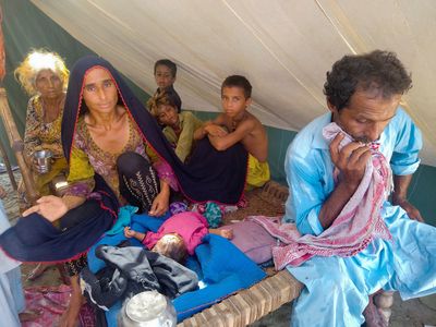 A child's death highlights threat posed to young by Pakistan's floods