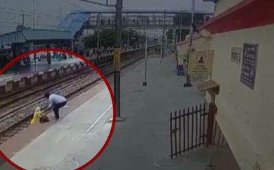 Watch | Alert cop saves woman from being crushed by speeding train in Uttar Pradesh