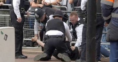 Man tackled by police in front of King Charles's car