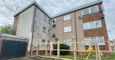 Attempted murder investigation launched after gang set fire to Kilmarnock flat