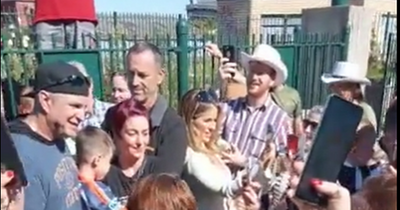 Garth Brooks delights fans as he joins sing-song at Dublin playground