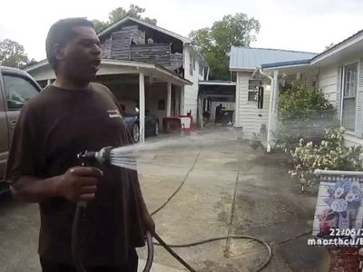 A Black pastor sues the police who arrested him while watering his neighbors' flowers