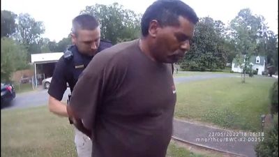 Black preacher arrested while watering flowers sues police