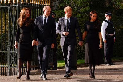 William and Harry united in grief as they meet well-wishers with their wives