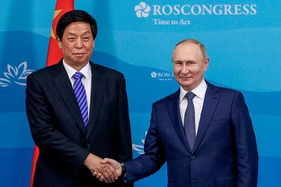 China legislator criticizes sanctions on visit to Russia