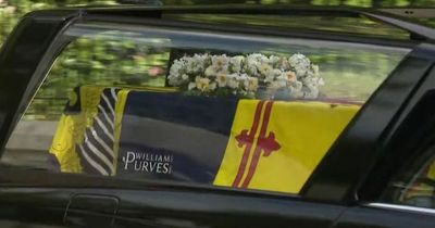 Queen's coffin seen for first time as 6-hour journey to Edinburgh begins