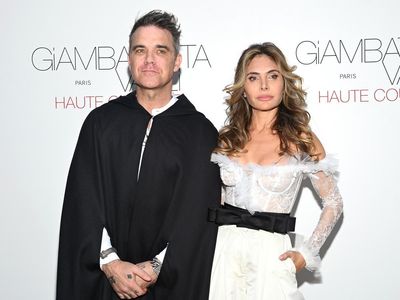 Robbie Williams praises wife Ayda Field for letting him be ‘consumed’ by work: ‘As long as it isn’t mood-altering substances’