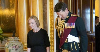 Eagle-eyed viewers spot Liz Truss breaking royal protocol when meeting King Charles