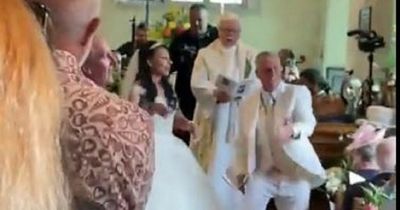 Brilliant moment Bez dances down the aisle at his wedding