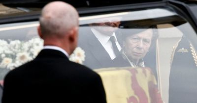 Queen's grieving children line up to greet her coffin as she arrives in Edinburgh