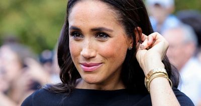 Meghan Markle's exchange with aide over bouquet at Windsor Castle walkabout