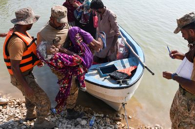 Pakistan to breach main highway to protect town of Dadu from floods