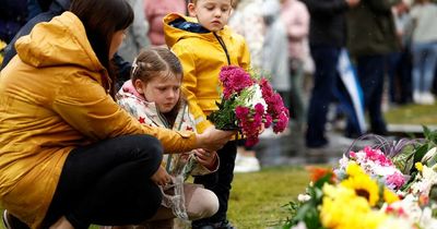 Britain mourns as hundreds of thousands gather to pay touching tribute to Queen