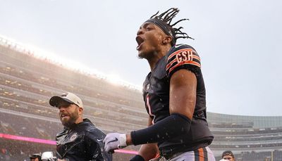 Bears celebrate rainy day win with victory slide into the end zone