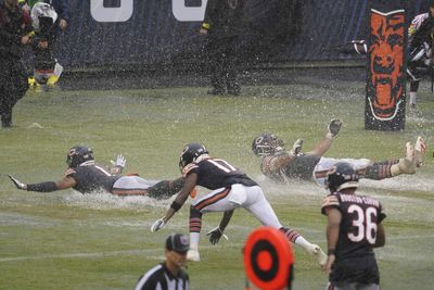 The Bears used Soldier Field’s rain-soaked turf as a slip-n-slide to celebrate upset over 49ers