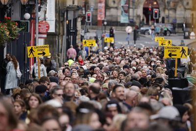 Queen death – latest: Thousands queue through night to pay respects after Charles leads coffin vigil