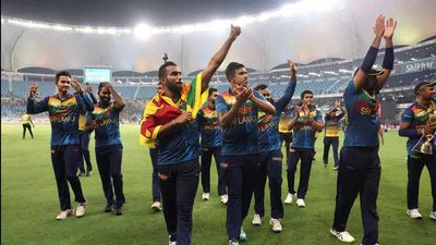 Afghanistan fans celebrate Sri Lanka's win over Pakistan in Asia Cup final
