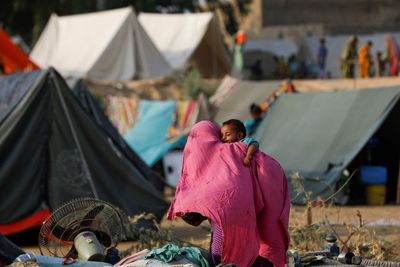 Pakistan races to keep floodwaters out of power station that supplies millions