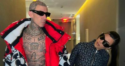 Kourtney Kardashian 'fell in love with eyes closed' as Travis Barker dons bizarre jacket