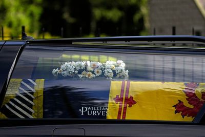 Funeral director branding on hearse carrying Queen’s body to Edinburgh disappears during journey