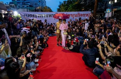 Thai protester accused of mocking queen gets 2 years' prison