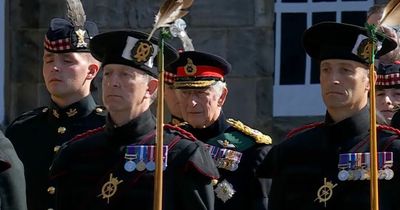 Emotional King Charles leads royals through Edinburgh as Queen's coffin moved