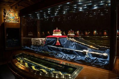 What is the Crown of Scotland and why is it placed on the Queen's coffin?