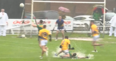 'They're playing with the tide!' - GAA match played in incredibly wet conditions