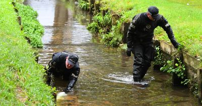 Officers wade through water in golf course hunt for weapons that killed Olivia