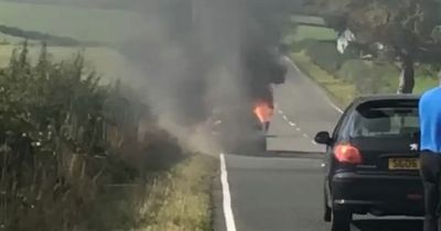 Car bursts into flames on road in Ayrshire as emergency crews race to scene