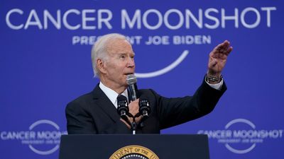 Biden evokes JFK call to harness ‘best of our energies’ in space race as he touts progress against cancer